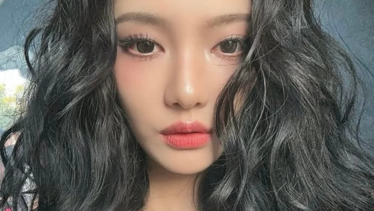 aespa's NingNing Turns Heads at Lollapalooza Chicago With Doll-Like Look