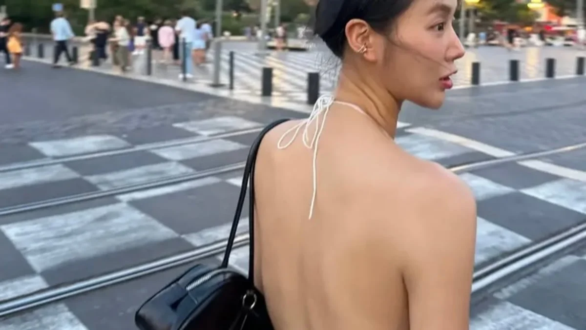 Soyou Shares Bold Paris Travel Snaps in Backless Halter Dress